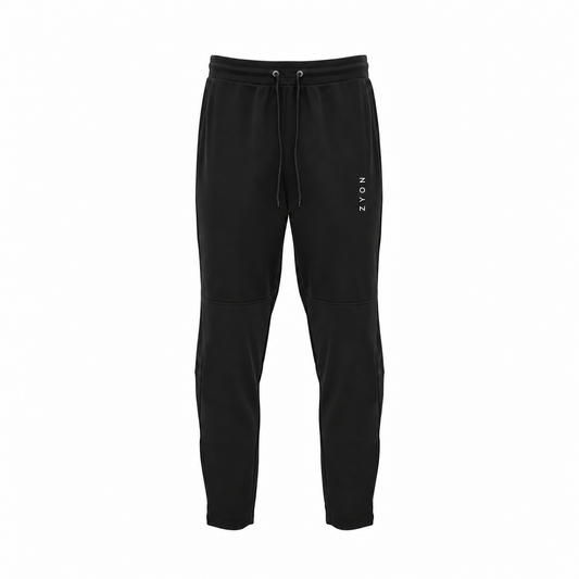 Pantalón largo unisex ZYON MOTION BLACK negro, vista frontal con logo blanco vertical
